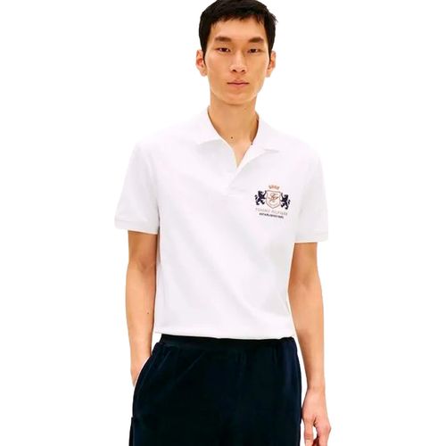 Playera tipo polo Tommy Hilfiger blanco para caballero MW0MW42774-YBR